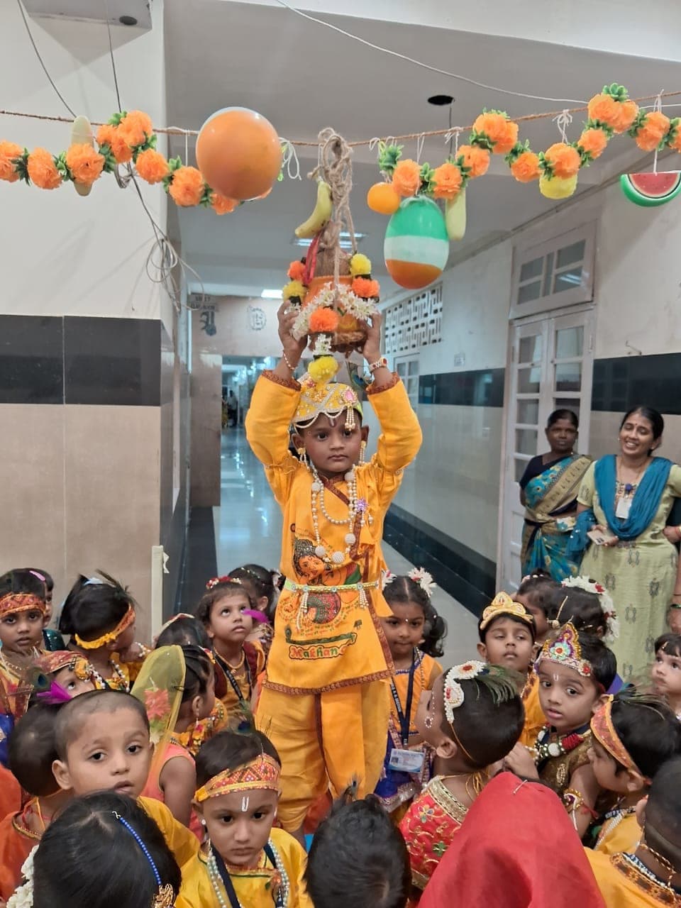 Kindergarten children marking a festival together.
